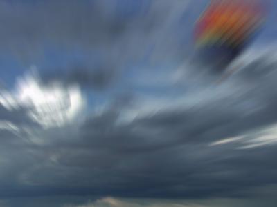 clouds moving rapidly past you